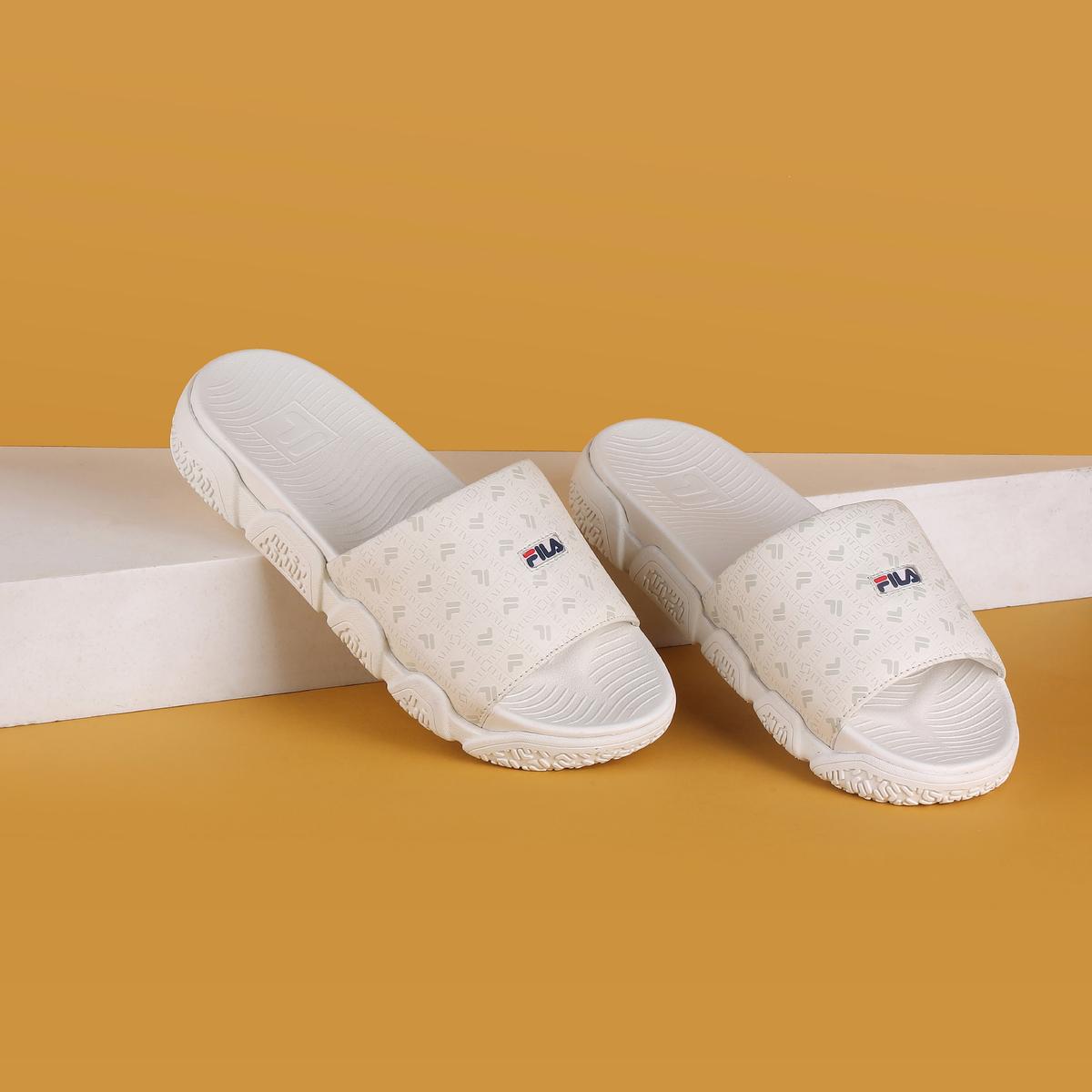 Fila disruptor slides best sale